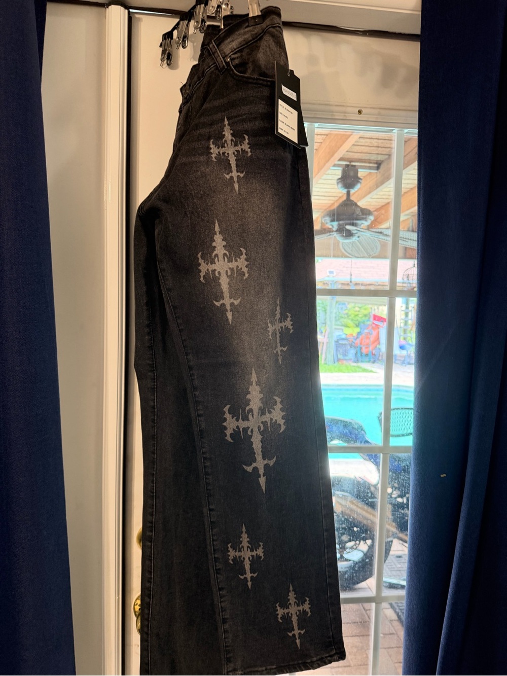 Black Wide-Leg Jeans with Subtle Cross Print